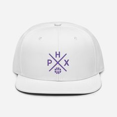 "Made of a premium wool blend with a high-profile, flat bill design, this Phoenix basketball snapback cap is sure to be a winner with loyal followers of Suns basketball and anyone who is from the 602 -- Phoenix, AZ. Features an old school vintage Phoenix basketball team design with cross. A cool and unique option for Sun fans, this adjustable snapback Phoenix hat is an awesome gift for a birthday, holiday, Christmas or game day. * High-profile, structured 6-panel basketball hat * 85% acrylic, 15 Custom Logo Snapback Hat For Sports Events, Custom Logo Flat Bill Snapback Hat For Sports Events, Custom Logo Flat Bill Snapback For Sports Events, Sports Snapback Hat With Custom Logo, White Snapback Hat For Streetwear With Flat Crown, Phoenix Basketball, Bill Design, Suns Basketball, New York Football