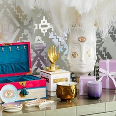 an assortment of decorative items on a table