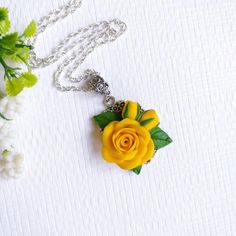 Yellow rose necklace - Polymer clay pendant Description: material - polymer clay fimo, metal base, waxed lace. Size - length 17 inches, diameter of the pendant - 1.57 * 1.18 inches. Care - respectful, waterproof. Delicate necklace with  rose. The rose is made by hand. Perfect jewelry for the bride. Gift for mothers day. Christmas present. If you have any questions, write to me. Polymer Clay Flower Necklace For Gift, Handmade Polymer Clay Jewelry With Flower Pendant, Elegant Yellow Flower Pendant Necklace, Handmade Polymer Clay Flower Pendant Jewelry, Flower-shaped Polymer Clay Necklace For Gift, Gift For Mothers Day, Yellow Necklace, Yellow Jewelry, Rose Pendant