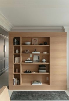 an open book shelf with books on it