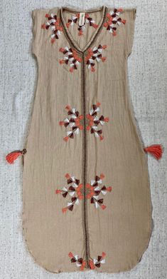 A Piece of Art! Hand embroidered details made by artisans in México Available in Black, Camel (Beige), and Turquoise Colours Lycra fabric: 80% polyester, 20% cotton CARE INSTRUCTIONS: Hand wash with cold water only. Do not bleach. Do not tumble dry. Traditional Beige Embroidered Summer Dress, Cotton Embroidered Dress With Resham Embroidery For Festival, Traditional Embroidered Cotton Dress For Vacation, Cotton Embroidered Dress With Multicolor Embroidery For Vacation, Multicolor Embroidered Cotton Dress For Vacation, Beige Cotton Embroidered Dress For The Beach, Bohemian Summer Dress With Tonal Embroidery, Spring Dresses With Multicolor Embroidery And Woven Motifs, Cotton Embroidered Dress With Woven Motifs For Summer