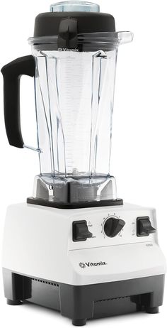 a white blender sitting on top of a counter