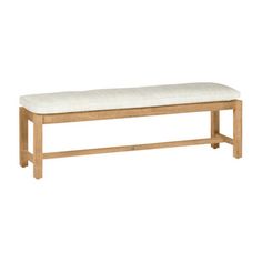 a wooden bench sitting on top of a white floor