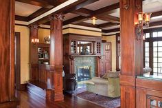 a living room filled with furniture and a fire place