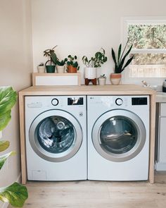 a washer and dryer sitting next to each other