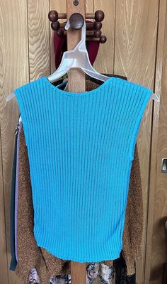 Vintage Blue Sleeveless Sweater Women’s Top Size Medium 1960s/70s  | eBay Blue Fitted Sweater Vest For Spring, Fitted Blue Sweater Vest For Spring, Retro Blue Vest For Spring, Blue Fitted Sweater Vest For Summer, Fitted Blue Sweater Vest For Summer, Retro Blue Sleeveless Top, Blue Sweater Vest For Summer, Vintage Blue Sleeveless Vest, Vintage Blue Vest For Spring