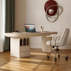 a white desk with a laptop on it and a chair next to it in front of a window