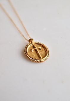 Antique distressed handcrafted coin with a raised cross pendant finished with a rope chain. 16" Plus 2" extender. Approx. 15mm coin unisex. Made to order. Handcrafted with love in LA Since each of our jewels is handcrafted in house sometimes it will take from 2-6 days for the item to be ship. Men Pendant, Antique Gold Cross Pendant Necklace, Gold Cross Jewelry With Coin Pendant, Silver Cross Necklace With Coin Pendant, Antique Brass Cross Pendant Jewelry, Vintage Brass Cross Pendant Jewelry, Clay Cross, Going For Gold, Antique Coins