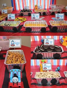 the table is set up with thomas the tank engine themed food and desserts for children's birthday party