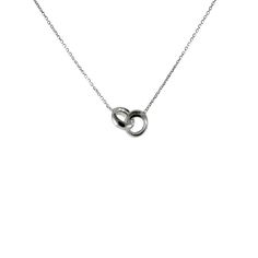 A beautiful and iconic "love lock", our interlocking rings necklace is both practical and glamorous. Made of Italian .925 sterling silver. Polished finish. Features two small circular rings that are connected in an infinite arrangement. A necklace that exemplifies sophistication and elegance. Wear casually or dress this necklace up with sterling silver stud earrings. 16 inch plus 2 inch extender Measurements: rings; .37 inch each; 16 inch plus 2 inch extender Material 925 sterling silver Sterling Silver Cable Chain Jewelry For Wedding, Silver Cable Chain Wedding Jewelry, Silver Cable Chain Jewelry For Wedding, Sterling Silver Link Necklaces For Anniversary, Anniversary Sterling Silver Link Necklaces, Timeless Silver Infinity Jewelry, Timeless Infinity Silver Jewelry, Modern Sterling Silver Infinity Necklace, Elegant Silver Open Circle Necklace