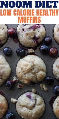 blueberry muffins in a muffin tin with the words noom diet low calorie healthy muffins