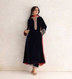 Beautiful straight cut long velvet kurti with pant and dupatta.The top has beads, sequin and zari hand embroidery over the neck sleeves and side pockets. velvet pant has hand embroidery over the bottom of the pant with contrast dupatta which has pace detailing and sprinkle sequin all over the dupatta. ✨If you want any changes in the outfit please contact us we will guide you as per your preference. ✨We assure you that we use only high quality fabric and threads to make any dress and you won't fa Velvet Suit Design, डिजाइनर कपड़े, Velvet Dress Designs, Velvet Suit, Elegant Attire, Kurta With Pants, Suit Designs, Indian Designer Wear, Party Wear Dresses