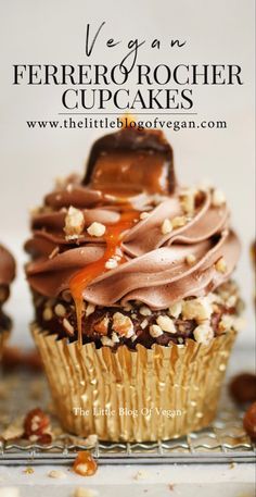 a cupcake with chocolate frosting and nuts on top