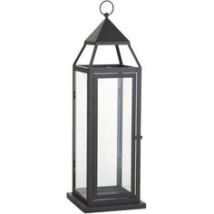 a large black lantern with an open top on a white background, it is lit up