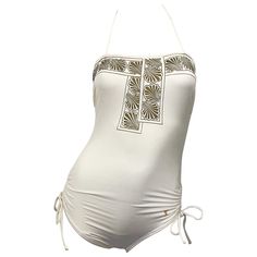 Beautiful and classic early 1980s YVES SAINT LAURENT ivory / off-white and gold seashell print one piece halter swimsuit / bodysuit! Features a flattering ruched waist that hides any 'problem' areas. Ties at each hip with a halter neck that ties at back neck. Metallic gold sea shell print around the top, with the YSL logo embroidered at the left hip. Great for the beach, yacht, or pool. Also great as a bodysuit paired with jeans, shorts or a skirt. In great condition. Made in France Approximatel Swimsuit For Sale, Gold Halter Top, Fantasy Manhwa, Luxury Swimsuits, Coverup Swimsuit, Seashell Print, Halter Swimsuit, Orange Swimsuit, Swimsuit Sale