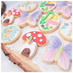 decorated cookies sitting on top of a table