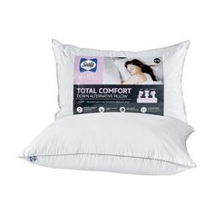 the pillow is white and has two pillows on it, one with an image of a woman's head