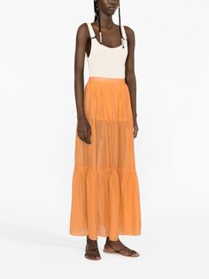 Recife voile tiered skirt from MANEBI featuring light orange, cotton-silk blend, sheer coverage, tiered skirt and ankle-length. Size Info IT Color Detail Orange Made In Italia Material Cotton 73%, Silk 27% Season One Spring-Summer Season Two Spring-Summer Product skirts Brand Manebi Size And Fit This piece fits true to size. We recommend you get your regular sizeModel is 1,75m / 5ft 8in wearing size 40 (IT) Trench Dress, Latest Fashion Design, Tier Skirt, Cotton Voile, Knitwear Cardigan, Pant Shirt, Tiered Skirt, Light Orange, Cotton Silk