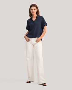 A favorite, refreshed. The Boxy Fit Short Sleeve Shirt has a classic collar, a clean button front, oversized grown-on sleeves, and a relaxed boxy fit. Dress it up with trousers and heels, or down with your favorite jeans for a casual-yet-polished look. 18 Momme Crepe De Chine Silk Lightweight and Wrinkle-Resistant Modern Button-up Blouse For Everyday, Modern Relaxed Fit Button-up Blouse, Modern Button-up Blouse With Relaxed Fit, Casual Blouse With Spread Collar For Business Casual, Everyday Relaxed Collared Blouse, Everyday Relaxed Fit Blouse With Collared Neckline, Relaxed Fit Blouse For Business Casual, Casual Relaxed Fit Blouse For Business, Relaxed Fit Casual Blouse For Business Casual