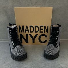 Madden Nyc Rhinestone Chunky Heel Combat Boots Women’s Size: 8.5 Condition: New In Original Box Material: Manmade Materials Upper; Manmade Materials Outsole Care: Wipe Clean Country Of Origin: Imported Closure: Lace-Up Closure With Inner Zip Features: Rhinestone Embellishments; Comfort Foam Insole; Flexible Lug Outsole; Welt Stitch Detail Women’s Chunky Lug Combat Boots From Madden Nyc Please Send Me A Message If You Have Any Questions ~~~Feel Free To Checkout My Other Listings ~~~ Thanks For St Trendy Rhinestone Boots For Fall, Trendy Rhinestoned Winter Boots, Trendy Rhinestone Winter Boots, Trendy Winter Boots With Rhinestones, Trendy Rhinestone Boots For Night Out, Trendy Silver Boots With Bling, Trendy Silver Boots With Silver Studs, Silver Boots With Rhinestone Rivets And Round Toe, Silver Round Toe Boots With Rhinestone Rivets