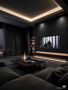 a living room filled with furniture and a flat screen tv mounted to the side of a wall