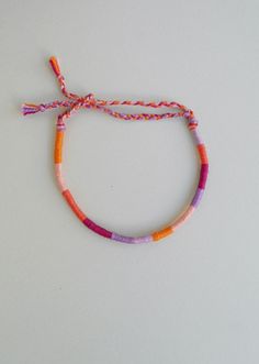 This wrapped bracelet is made out of 6 different colours of cotton thread It has a tie knot closure and is ended with two braids in order to fit a lot of sizes. Thickness: 0,4cm Similar wrapped bracelets in my shop: https://www.etsy.com/listing/462500661/pastel-friendship-braceletcotton?ref=listing-shop-header-0 More friendship bracelets in my shop: https://www.etsy.com/shop/LuckyRatJewellery?section_id=16489590&ref=shopsection_leftnav_7 *Colors may differ slightly from the original due to t Bracelet For Friends, Funky Bracelets, Thread Wrapped Bracelets, Bijoux Piercing Septum, Bracelet Cotton, Simpul Makrame, String Bracelet Patterns, Yarn Bracelets, Cute Friendship Bracelets