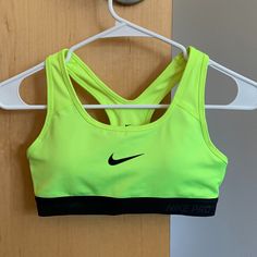 Brand New Nike Dri-Fit Sports Bra, Never Worn Before (Top Tag Was Ripped Off, Bottom Tag With Size Is Still Attached). Size Xs, Neon Yellow. Comes With Removable Pads. From A Smoke Free, Pet Free Home. Please Feel Free To Make Me An Offer! :) Fitted Yellow Tops For Sports Events, Fitted Green Nike Activewear, Fitted Nike Green Activewear, Yellow Sleeveless Activewear For Sports, Yellow Sleeveless Sports Activewear, Yellow Sleeveless Sportswear Activewear, Yellow Stretch Sports Bra, Yellow Sleeveless Sports Bra For Gym, Yellow Fitted Sports Bra For Gym