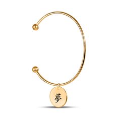 DREAM Incorporating Japanese characters into your personalized bangle bracelet adds a unique and elegant touch that is both meaningful and visually stunning. Japanese letter/character/kanji, 夢(yume) means DREAM. The word embodies hope, ambition, and vision that you wish to share with your loved one. It's a beautiful way to express your support of your loved one in their journey and to celebrate their/your aspirations and achievements. The fluid strokes and intricate details of Japanese script ad Symbolic Round Bangle For Gifts, Symbolic Gift Bangle, Symbolic Engraved Bangle As Gift, Japanese Script, Japanese Letter, Kanji Japanese, Japanese Characters, Intricate Details, Custom Engraving