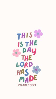 the words, this is the day the lord has made and flowers are painted on it