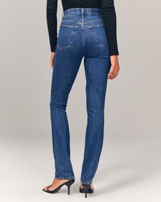 Our 90's-style high rise slim straight jeans in a full-length fit that sits high on the waist, fitted at the top of the body and relaxes slightly below the knee for a straight-leg look. Features a marbled dark wash and clean hem. Straight Dark Jeans, Iconic 90s, Dark Material, Women's Bottoms, American Clothing, Slim Straight Jeans, Jean Slim, Vintage Chic, 90s Fashion