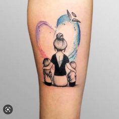 a woman's leg with a tattoo on it that has an image of two people sitting