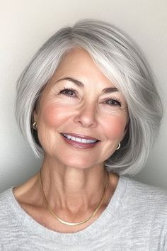 Save this pin for the best hairstyles for women over 70. This chic bob has side-swept bangs that add a touch of sophistication and playfulness.  The length hits right at the chin, creating a slimming effect. Chin Length Hair Styles, Medium Length Waves, 70 Hairstyles, Subtle Blonde Highlights, Shoulder Length Layered, Best Hairstyles For Women, Thick Hair Cuts, Classic Hollywood Glamour