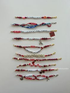 a bunch of beads that are hanging on a wall