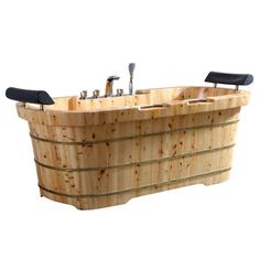 a wooden bathtub with two faucets and soap dispensers