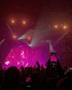 melanie martinez concert with pink confetti falling from the sky. a visual from her portals album on the screen behind. Pink Concert Aesthetic, Melanie Martinez Portals Concert, Concert Confetti, Melanie Martinez Portals Tour, Melanie Martinez Aesthetic, Butterfly Confetti