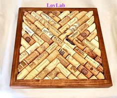 Our hand crafted trivets measure approximately 13 x 13 and are made with wine corks from all over the world!n Never again worry about ruining a nice dining table with a hot pan or casserole dish! Wine Corks Ideas, Diy Corks, Wine Cork Trivets, Cork Trivets, Wine Cork Trivet, Cork Crafts Christmas, Cork Ideas, Wine Cork Diy Crafts, Cork Crafts Diy