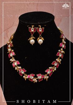 Set in the exquisite Jadau style, we present a necklace and earring set with pink and white stones in a classic design! Add a dash of vibrance to your jewelry collection with this blooming lotus neckpiece with consecutive unites to wrap around the neck like a choker or rest lower like a necklace! This set comes with a matching pair of earrings. Note: some of the images are enlarged for detailing, refer to the cover picture for a perspective on the size. Note: This set does not contain any precio Blooming Lotus, Cover Picture, Lotus Jewelry, White Stones, Necklace And Earring Set, Cover Pics, Precious Metal, White Stone, Salwar Kameez