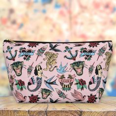 Our tattoo themed flat bottom pouches vary from small to large and can be used for pretty much anything. They make excellent project bags, pencil cases, cosmetic travel bags, and perfect for gifting. They are constructed from a durable material with a black or white zipper closure. ◆ Visit Our Shop:  www.PlantsyPrintsCompany.Etsy.com ◆ Zippered Pouches:  www.etsy.com/shop/PlantsyPrintsCompany?section_id=42738417 { POUCH DETAILS } ↠ Zipper Closure ↠ Non-woven laminate inside ↠ Print is on both si Novelty Rectangular Pencil Case For Everyday Use, Artistic Zipper Pencil Case As Gift, Retro Bags With Zipper Pouch For Gifts, Retro Gift Bag With Zipper Pouch, Retro Bags With Zipper Pouch As Gift, Artistic Pencil Case With Zipper For Daily Use, Traditional Tattoo Prints, Bag Tattoo, Zippered Pouches