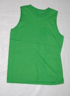 USA Standard Size: Boy's Extra Small 4-5 Brand: Fruit of the Loom Boys sleeveless muscle tee shirt. Bright green, solid color. Material: 100% cotton One standard photo used to represent all sizes and may not match the size indicated in this listing. Plain Green Top For Summer, Casual Green Tank Top, Basic Green Tank Top For Summer, Green Sleeveless Muscle Tee For Spring, Basic Green Summer Tops, Green Basic Summer Tops, Cheap Solid Color Muscle Tank Tee, Basic Green Plain Top, Casual Green Sleeveless Top