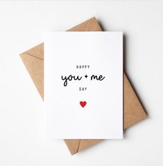 a card with the words, happy you and me day written on it in black ink