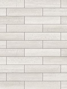 a white brick wall that has been painted with wood grains and is very light gray