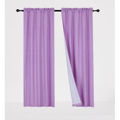 the purple curtains are open and ready to be hung