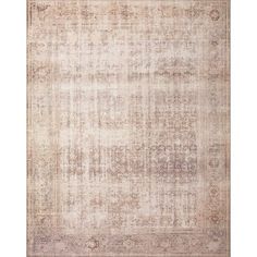 an antique style rug with faded colors and patterns on the bottom, in neutral tones