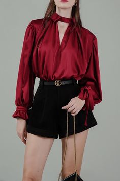 Elegant Evening Blouse With Pleated Sleeves, Elegant Red V-neck Blouse, Office Blouse With Blouson Sleeves, Formal Tops With Blouson Bishop Sleeves, Elegant Fitted Tops With Gathered Sleeves, Chic Silk Blouse, Chic Solid Color Silk Blouse, Chic Silk Blouse In Solid Color, Evening Tops With Pleated Lantern Sleeves