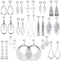 a bunch of different types of earrings