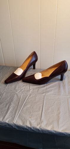 "These are pre owned and look barely worn. There is minimal to no wear anywhere on the shoes. 2 3/4\" heel. The color is a dark red like oxblood. the shoes are in very good condition. They came to me with the bottom half of the box, no lid. The box is for the right shoe just a different color." Brown Slip-on Heels With Buckle Closure, Heeled Pumps, Women's Pumps, Womens Heels, Dark Red, Pumps Heels, Vintage Black, Shoes Women Heels, Kitten Heels