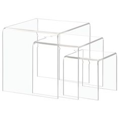 three clear plastic boxes sitting next to each other