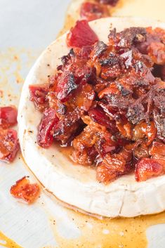 a tortilla covered in bacon and other toppings