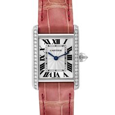 Cartier Tank Louis White Gold Diamond Pink Strap Ladies Watch WJTA0011 Box Papers. Manual winding movement. 18k white gold case 29.5 x 22.0 mm. Circular grained crown set with diamond. Original Cartier factory diamond bezel. Scratch resistant sapphire crystal. Silver guilloche dial with black roman numerals. Sword shaped blue hands. Secret Cartier signature at X. Pink leather strap with 18K white gold deployant buckle. Cartier Tank Louis, Paper Diamond, Patek Philippe Aquanaut, Modern Watches, Box Paper, Cartier Tank, Gold Case, Pink Bracelet, Bezel Diamond