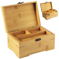 an open wooden box sitting on top of a white table next to another box with two compartments